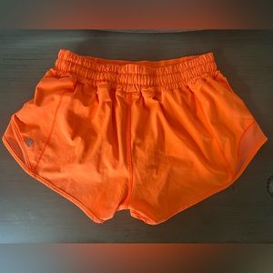 Orange lululemon hotty hot 2.5 shorts